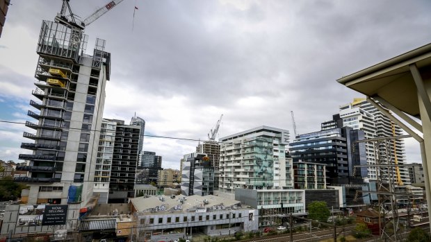 Cranes dot the South Yarra skyline alongside the railway station. 