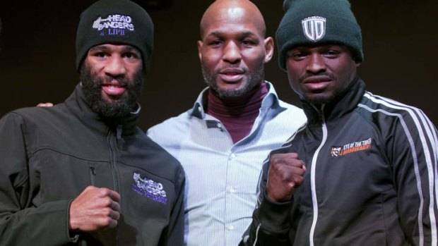 Lamont Peterson, left, and Dierry Jean, right, flank Bernard Hopkins during a press conference on Thursday.