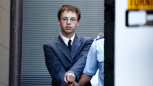 Jack Kelsall being led to a prison van on March 16, 2015, during his trial for Morgan Huxley's murder at the NSW Supreme court.