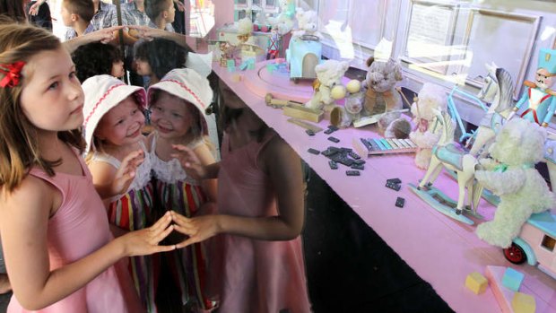 Tickled pink: The festive season has brought children and parents from across NSW to Sydney for shopping.