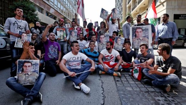 Kidnappings continue: Families of missing Lebanese who were kidnapped by Islamic State militants and the Al-Nusra Front protest for their release in Beirut, Lebanon. 