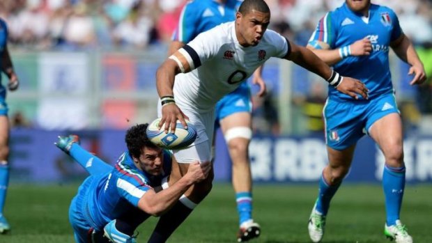 Luther Burrell attempts a line break.