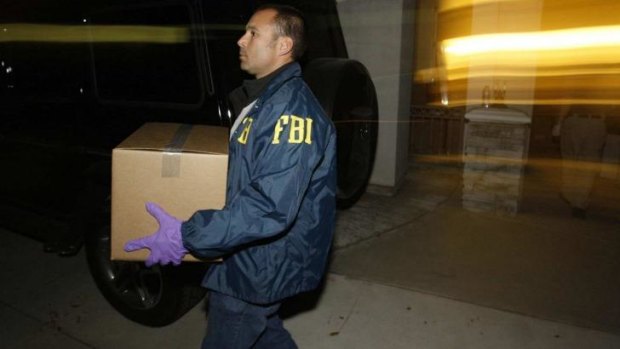Jaw-dropping fraud: FBI agents remove evidence from Rudy Kurniawan's home.