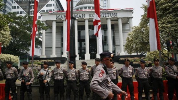 Indonesian policemen outside the Constitutional Court in Jakarta.
