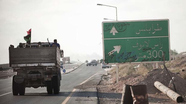 A rebel vehicle on the road to Sirte.
