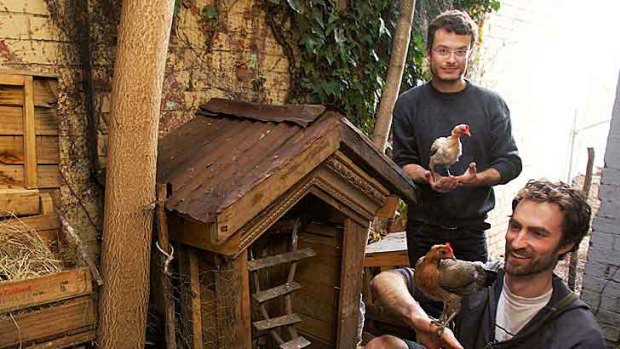 Urban Bush Carpenters Andrew Poppleton (left) and Geoff Steendam with their recycled-timber hen house that helped put them in the finals of the  inaugural Earth Hour awards.