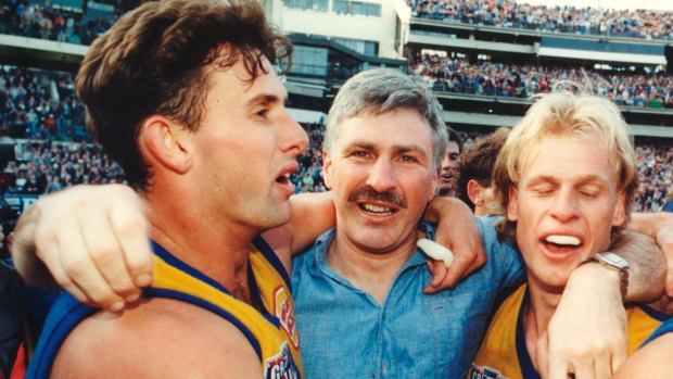 West coach stars Brett Heady and Dean Kemp celebrate with coach Mick Malthouse back in 1992.