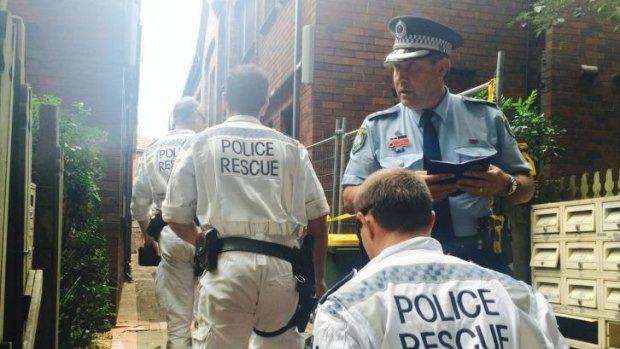 Police rescue officers arrive at the unit block in Mulwarree Avenue, Randwick.  