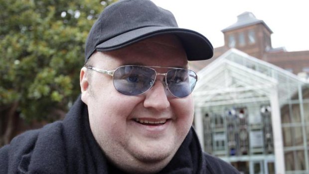Kim Dotcom leaves the High Court in Auckland.