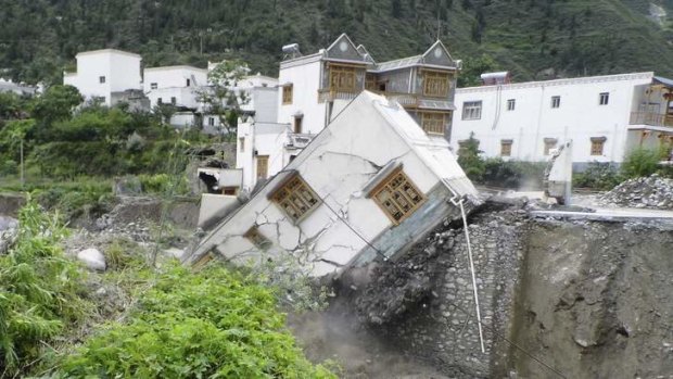 A landslide damaged houses in Aba Tibetan and Qiang Autonomous Prefecture, Sichuan Province.