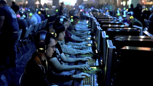 Fans and players from around the world play StarCraft at BlizzCon 2011.