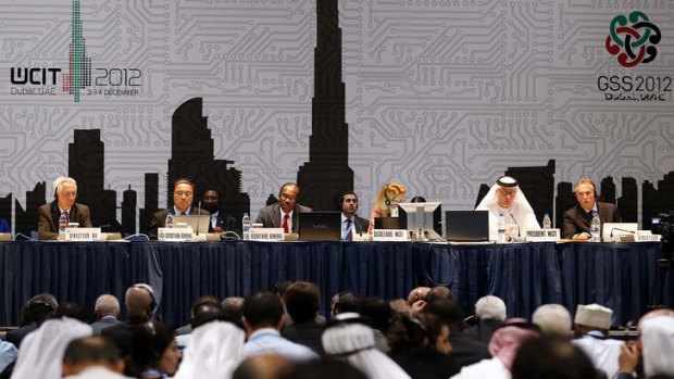 Hamadoun Toure (centre),  secretary general of the International Telecommunication Union (ITU), addresses a joint press conference on the final day of the World Conference on International Telecommunications.