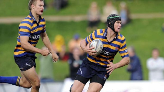 Stepping out ... World Cup-bound Berrick Barnes impressed at fullback for Sydney University during the Shute Shield clash against Gordon yesterday.