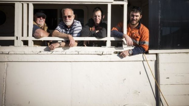 All aboard: Norm Whitburn with veterans Richard Eddy,Marty Sowerby and James Erwin on the RV Pax at Henderson in Perth.