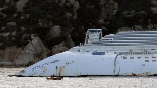 The wreckage of the Costa Concordia still lies next to Giglio Island.