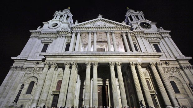 Protesters stage a mass meditation outside London’s St Paul’s Cathedral.