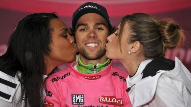 Sweet win ... Michael Matthews receives the kiss of the race's hostesses after taking the sixth stage of the Giro d'Italia, Tour of Italy, from Sassano to Montecassino.
