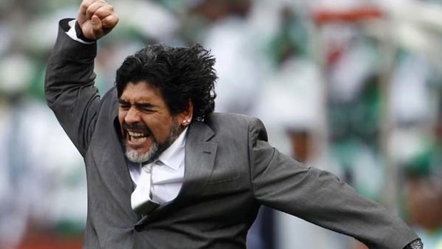 Diego Maradona celebrates his team's goal against Nigeria.