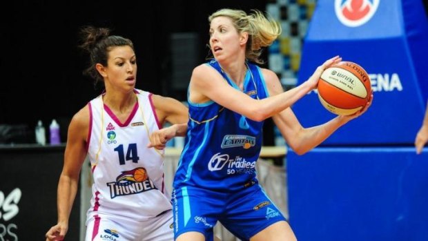 Carly Wilson of the Capitals in action against Logan Thunder last season. The Thunder have folded, which has left south-east Queensland without a top-tier basketball side.