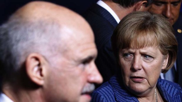 Greece's Prime Minister George Papandreou and Germany's Chancellor Angela Merkel.