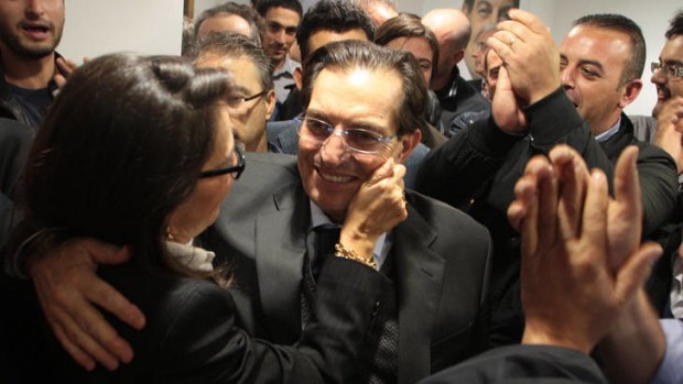 Champion of the south ... Rosario Crocetta is congratulated as the results of the election come in.