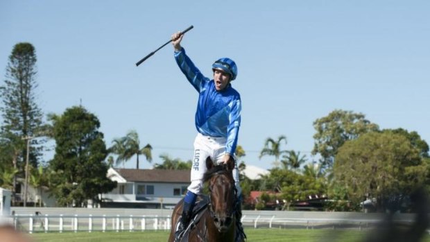 Jockey Nathan Berry celebrates his win on Unencumbered in the Magic Millions Classic at the Gold Coast in January.