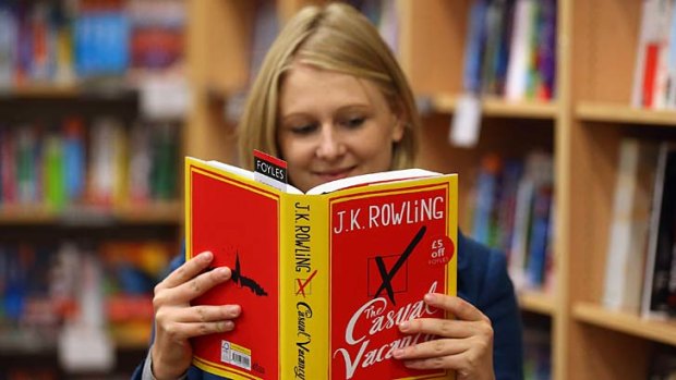 Can women's literature help men? Above, a woman reads JK Rowling's novel <em>The Casual Vacancy</em>.