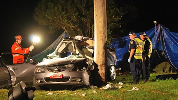 Crash ... a boy and girl died after the car they were in hit a power pole.