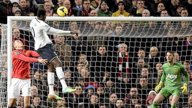 Revival: Tottenham Hotspur's Emmanuel Adebayor scores against Manchester United after new coach Tim Sherwood restored him to the side.