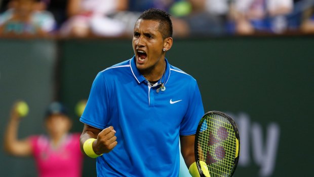 Nick Kyrgios celebrates winning a game against Denis Kudla at Indian Wells on Saturday.