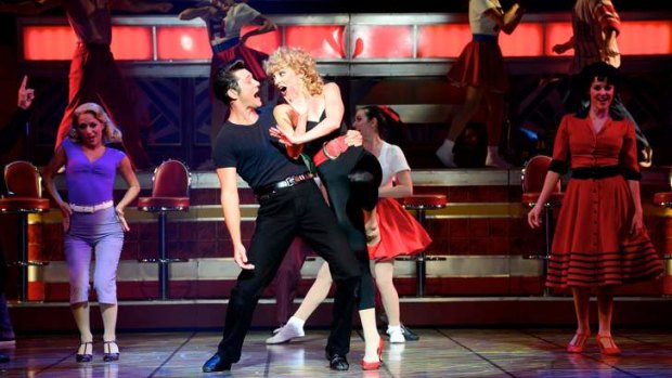 Summer lovebirds ...  Robert Mills as Danny and Gretel Scarlett as Sandy are the leads in Grease.