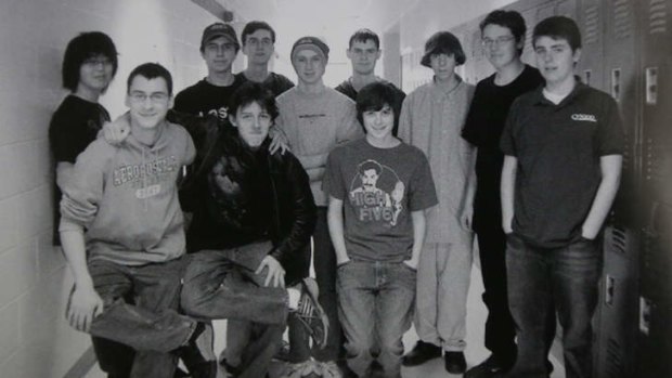 'We were not in favour of first-person shooter games' ... Adam Lanza, third from right, with members of the technology club at Newtown High School.