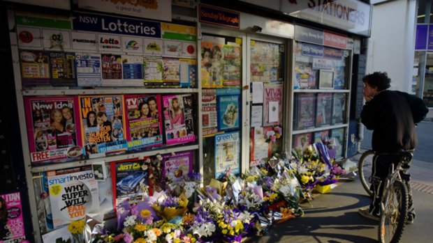 Memorials left outside the Lin family's newsagency in Epping, Sydney.