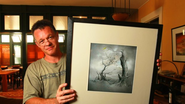 Graeme Base Children's Author of Animalia fame, with his artwork which is being auctioned on Ebay for fire victim donations.