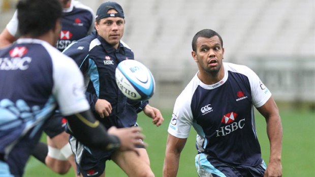 Final countdown ... Phil Waugh and Kurtley Beale train with Waratahs teammates at Eden Park yesterday.
