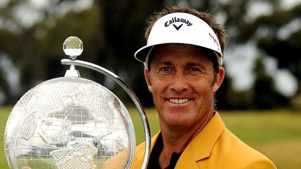 Stuart Appleby holds the trophy after winning the 2010 Australian Masters.