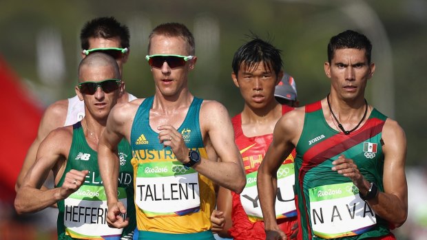 Tough conditions: Jared Tallent of Australia (middle).