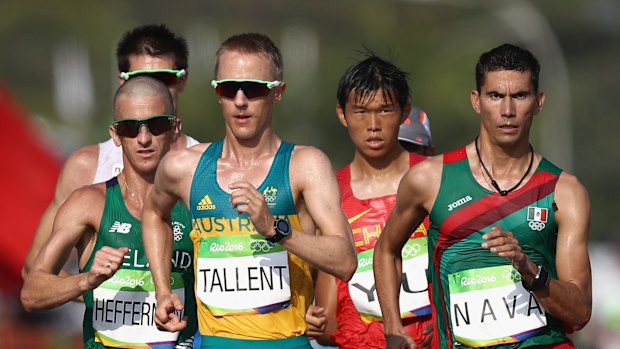 Tough conditions: Jared Tallent of Australia (middle).