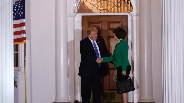 In this November photo, President-elect Donald Trump and Rep. Cathy McMorris Rodgers, shake hands.