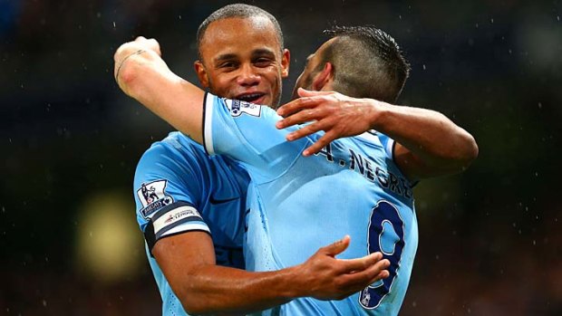 Kompany man: Manchester City captain Vincent Kompany has plenty to celebrate with Alvaro Negredo.