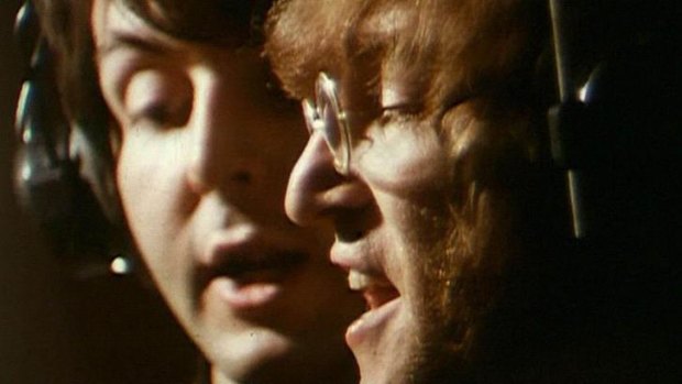 Paul McCartney, left, and John Lennon of the Beatles recording the track <i>Hey Bulldog</i> at the Abbey Road studios in London on February 11, 1968.