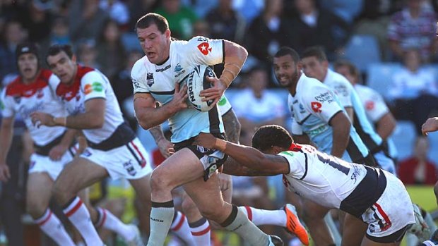 Paul Gallen breaks through the defence for the Sharks.