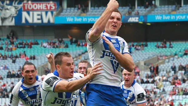Jonathan Wright celebrates his miracle try for the Bulldogs.