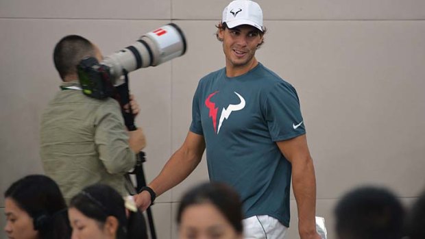 Rafael Nadal arrives for a media conference in Shanghai on Tuesday.