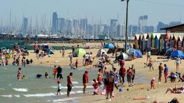 Weather forecast or lottery numbers? ... Bathers cool off at St Kilda beach earlier this month.