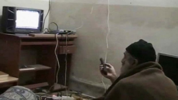 Osama bin Laden is shown watching himself on television in this video still released  by the Pentagon.