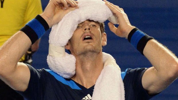 Andy Murray cools down with an ice towel during his men's singles match against France's Vincent Millot on day four of the 2014 Australian Open.