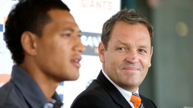 Happier days &#8230; Dale Holmes, right, with star recruit Israel Folau.