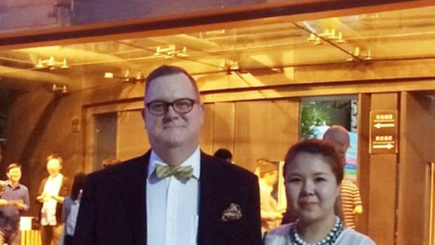 Jeff Sikkema with wife Jiang Ling who he says was ''arrested her for processing visas".