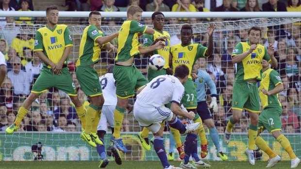Chelsea's Frank Lampard  strikes a free-kick over the Norwich City wall.